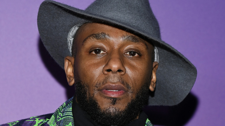 Yasiin Bey in pointy hat