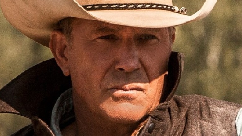 Kevin Costner wears a cowboy hat