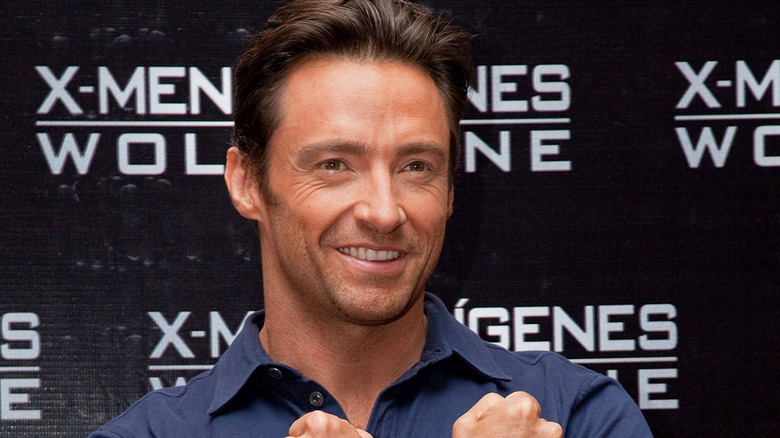 Hugh Jackman poses like Wolverine