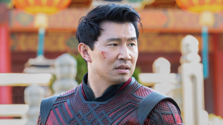 Shang-Chi stands in front of a temple in "Shang-Chi and the Legend of the Ten Rings" (2021)