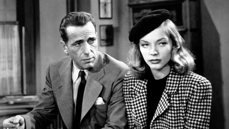 Humphrey Bogart gazing at Lauren Bacall
