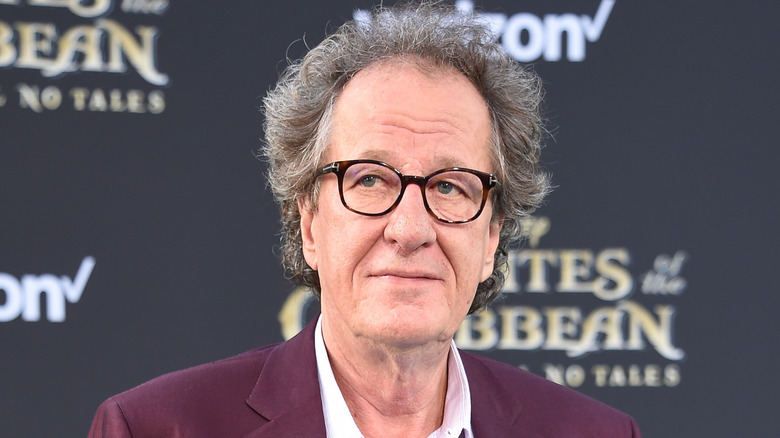 Geoffrey Rush wears glasses