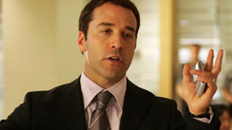 Jeremy Piven holds a cellphone