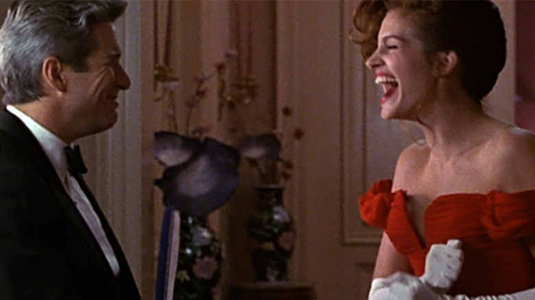 Ed gives a gift to Vivian