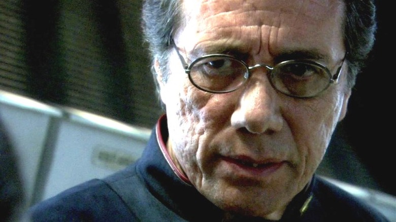 Captain Adama looks at his console