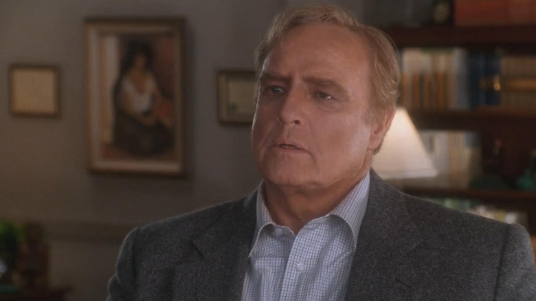 Brando looks left