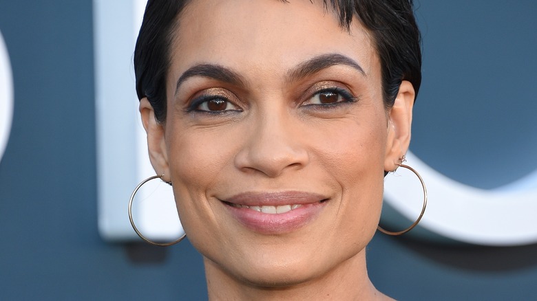 Rosario Dawson smiles short hair