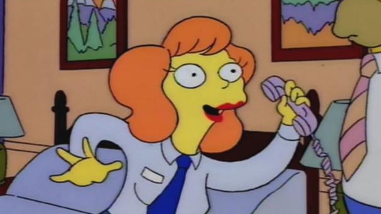 Mindy answers the phone