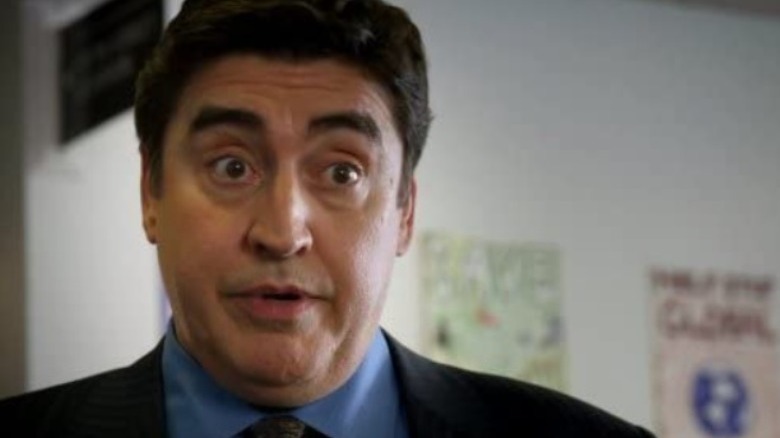 Morales in suit and tie
