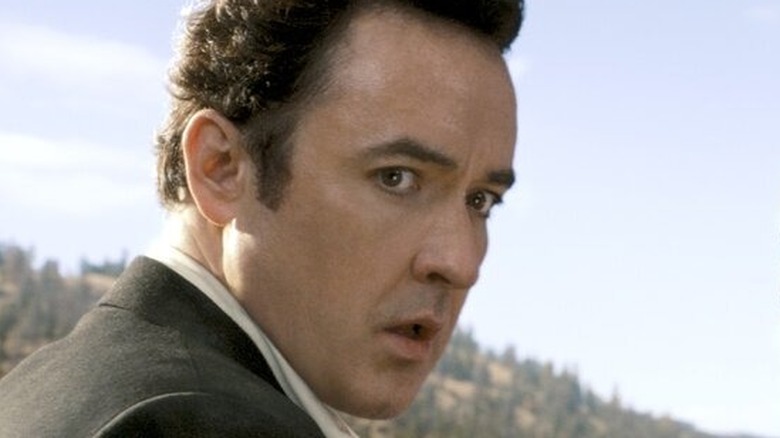 John Cusack looks over his shoulder