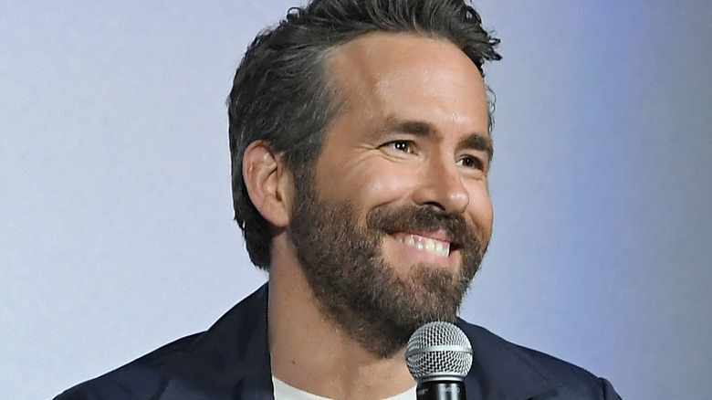 Ryan Reynolds speaking into mic