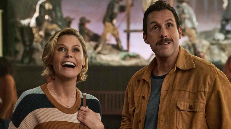 Julie Bowen and Adam Sandler grinning