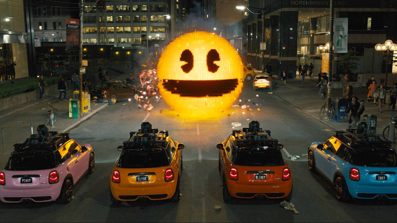 Pac-Man facing off against fighters