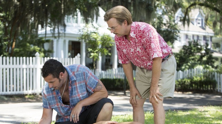 Adam Sandler and David Spade kneeling