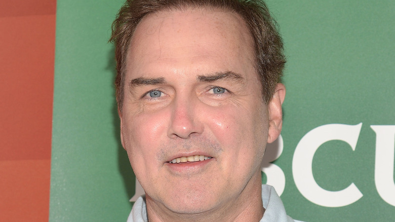 Norm Macdonald smiling