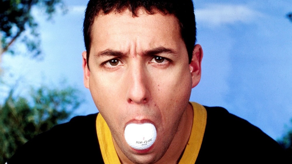 Happy Gilmore with a golf ball in his mouth