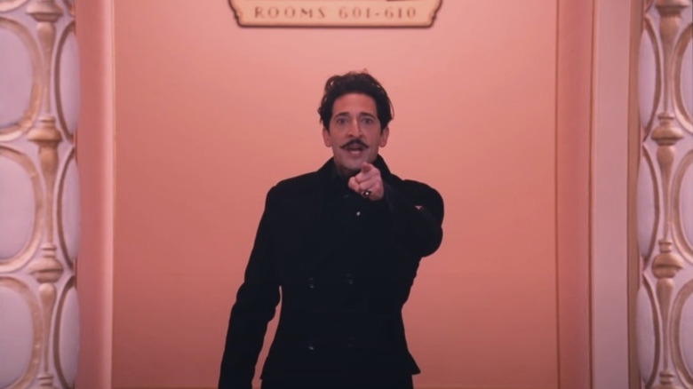 Adrien Brody angrily pointing