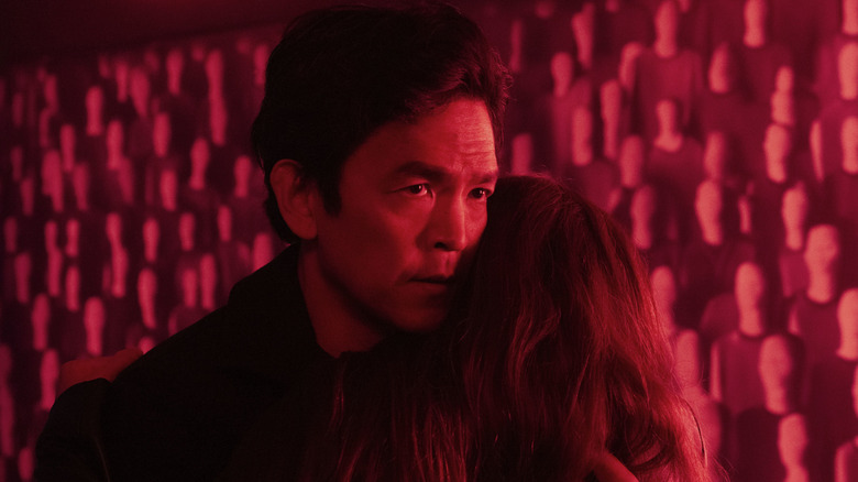 Curtis hugging in red room