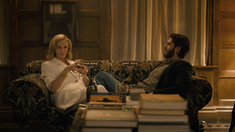 Alma and Hank sitting on couch together in After the Hunt