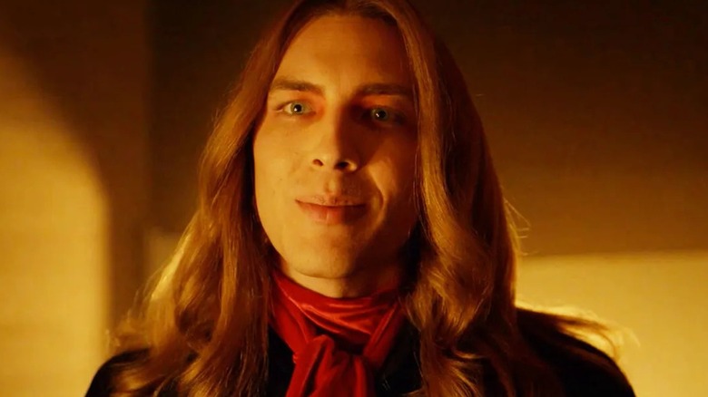Michael Langdon in close-up with long blond hair