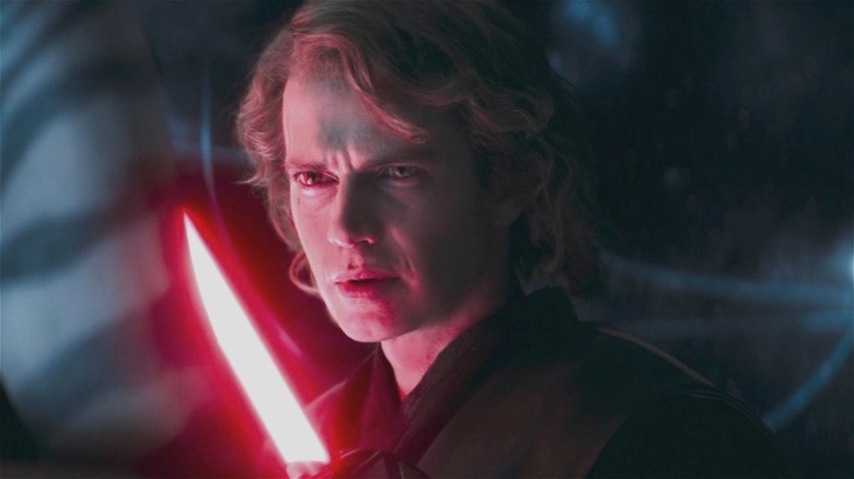 Sith Anakin holding a red light saber
