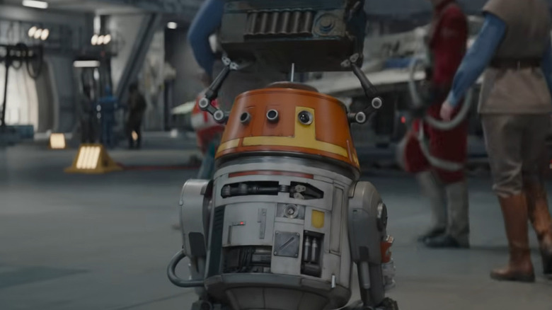 Chopper rolling through a New Republic hangar bay in Ahsoka season 2 (2027