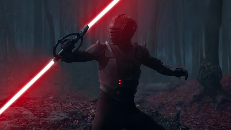 Marrok holding dual-bladed lightsaber