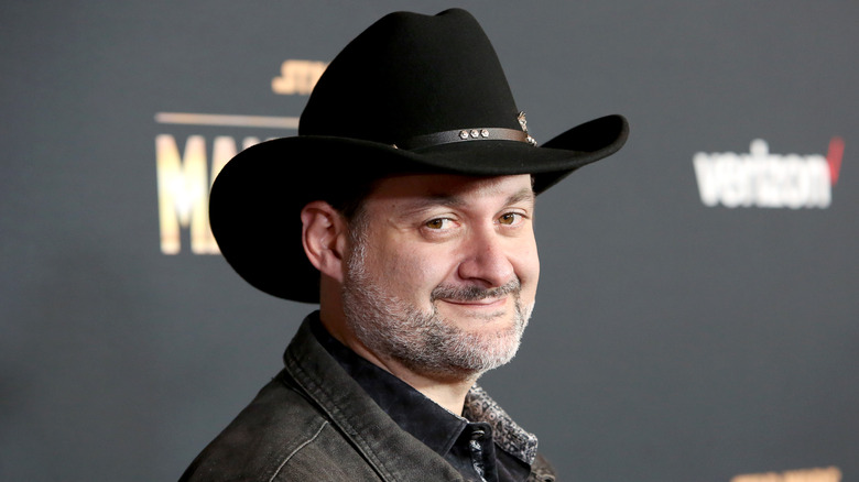 Dave Filoni smiles