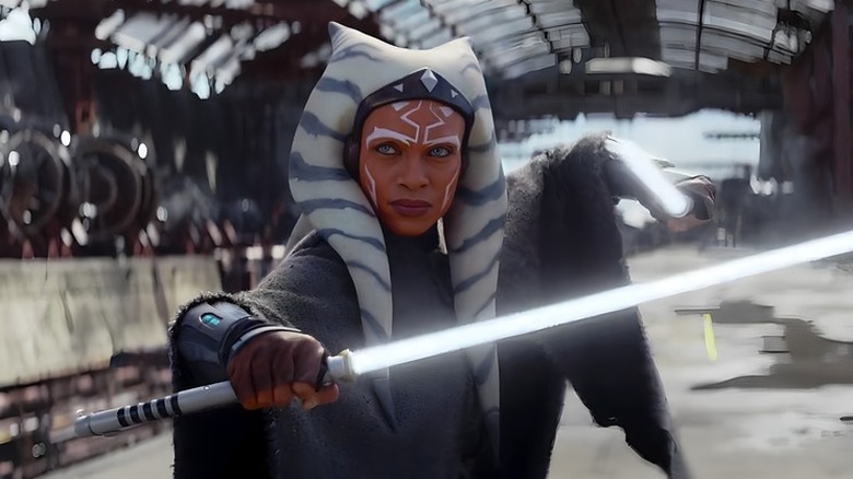 Ahsoka holding lightsaber