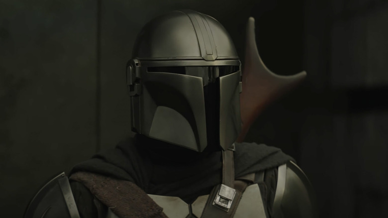 The Mandalorian staring