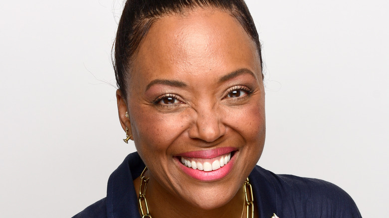 Aisha Tyler smiling