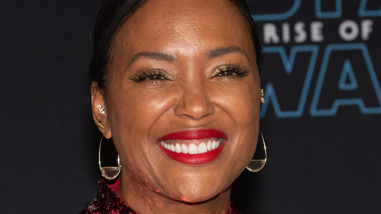 Aisha Tyler smiling