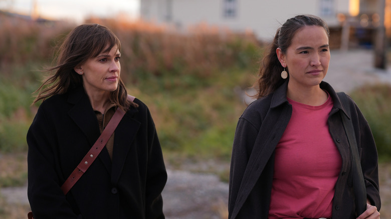 Eileen and Roz talking to someone