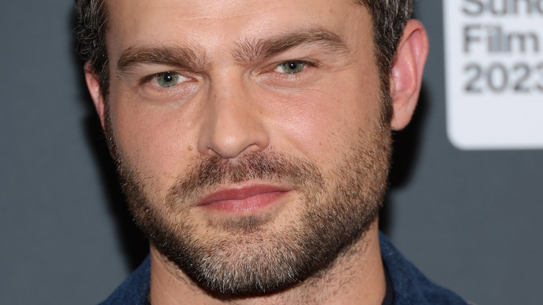 Alden Ehrenreich posing at Sundance 