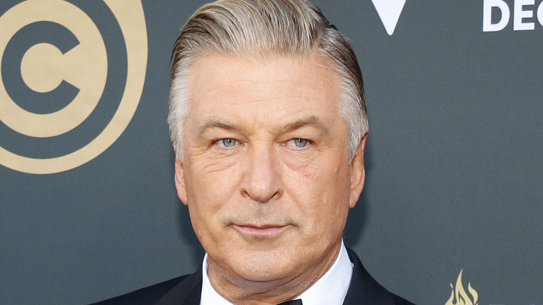 Alec Baldwin looking to his left