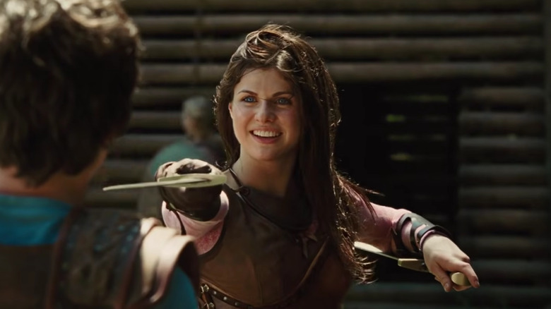 Annabeth Chase wielding a sword and smiling in Percy Jackson & The Olympians: The Lightning Thief