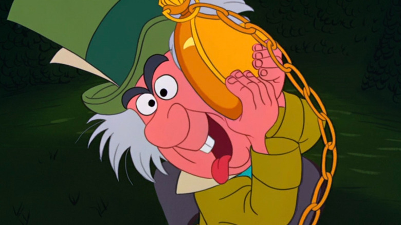 The Mad Hatter listening to a clock