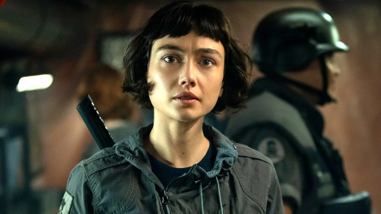 Wendy standing near a soldier in "Alien: Earth"