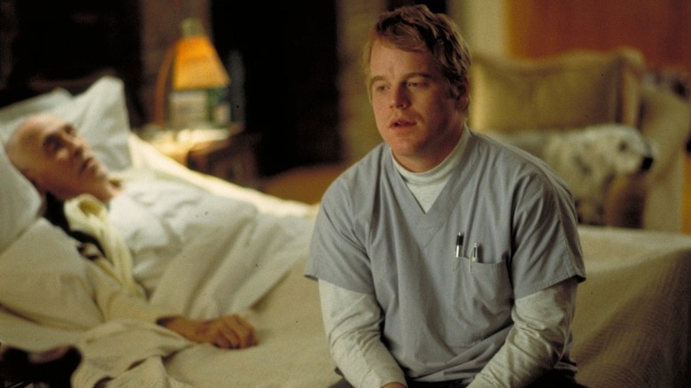 Phil Parma on the edge of a bed in "Magnolia" (1999)
