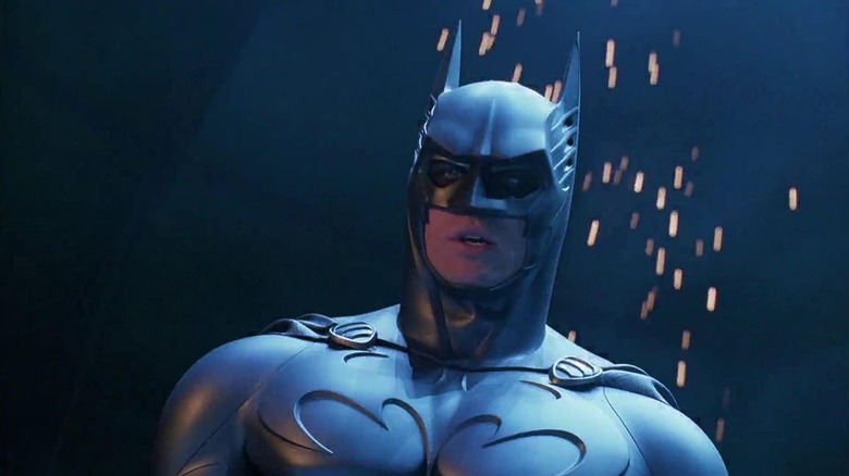Batman explaining who he is to Two-Face in Batman Forever (1995)