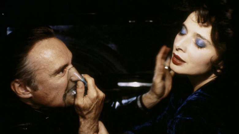 Frank Booth caresses Dorothy Vallens in "Blue Velvet" (1986)