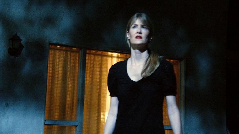 Nikki Grace wanders outside a house in "Inland Empire" (2006)