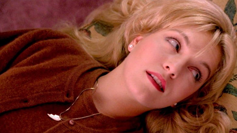 Laura Palmer lies on a couch in "Twin Peaks: Fire Walk with Me" (1992)