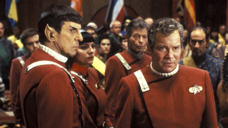 Kirk and Spock standing before Azetbur looking serious in "Star Trek VI: The Undiscovered Country" (1991)