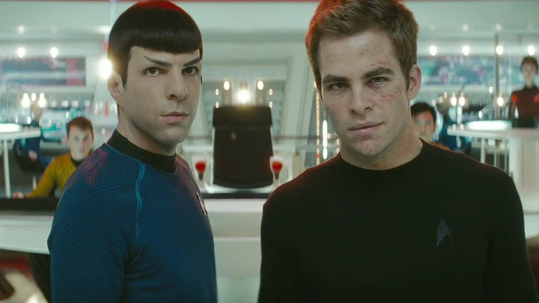 Kirk and Spock look at the viewscreen in "Star Trek" (2009)