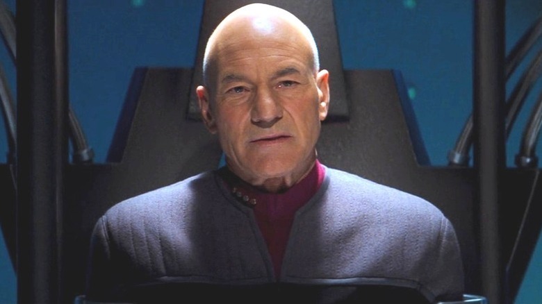 Captain Picard sits in an elaborate chair in "Star Trek: Nemesis" (2002)