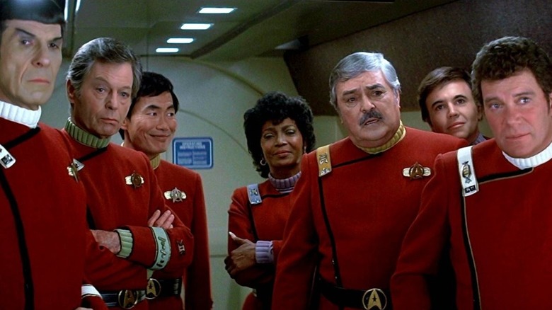 The crew looks out a port window in "Star Trek V: The Final Frontier" (1989)