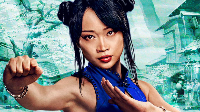 Chun-Li taking a fighting stance against a light green backdrop
