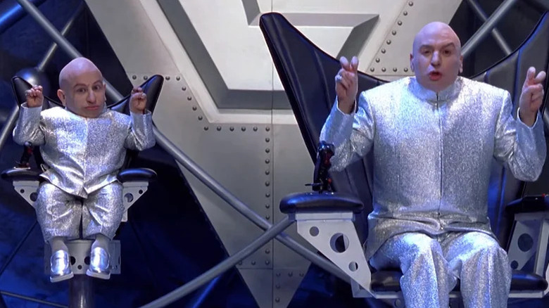 Mini-Me and Dr. Evil using air quotes in Austin Powers: The Spy Who Shagged Me