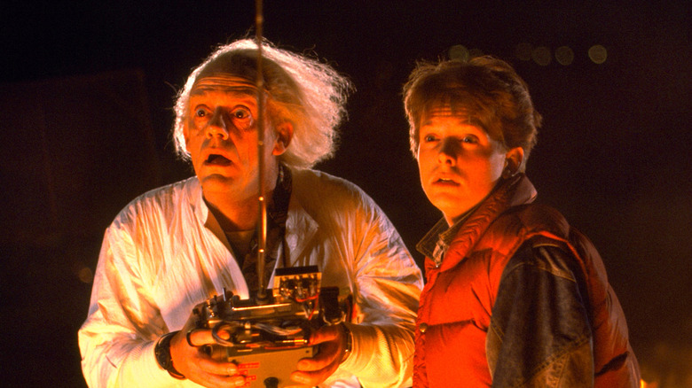 Doc Brown and Marty McFly witnessing time travel in Back to the Future (1985)